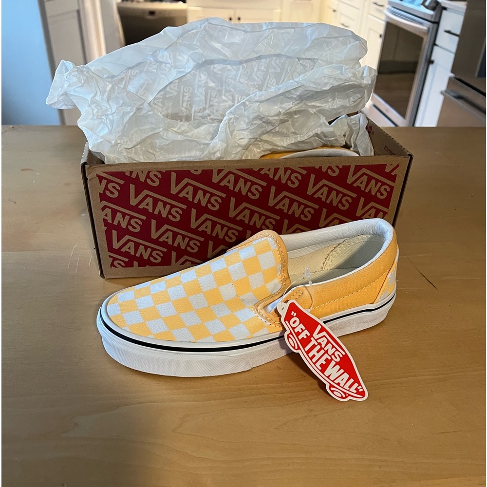 Vans. CHECKERBOARD SLIP-ON SHOE. Need Never worn,Orange and white checker.